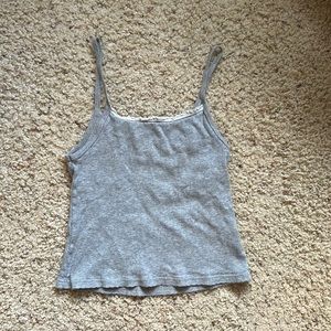 Grey Brandy Melville top with white lace trim.